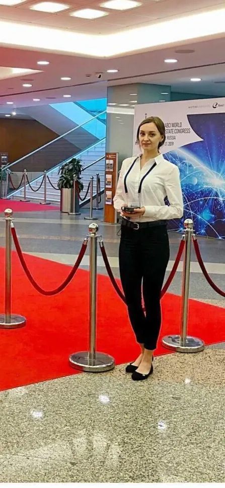 Hostess meeting guests at the entrance